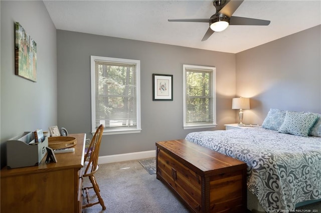 bedroom with ceiling fan and carpet flooring