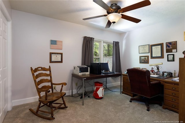 office space featuring ceiling fan and carpet floors