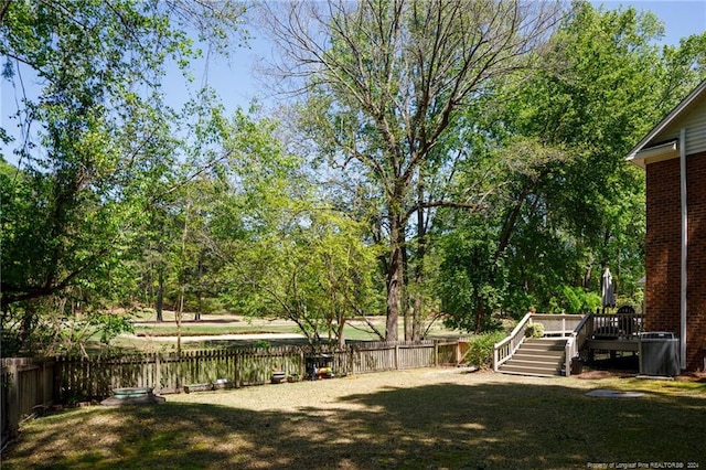 view of yard featuring a deck