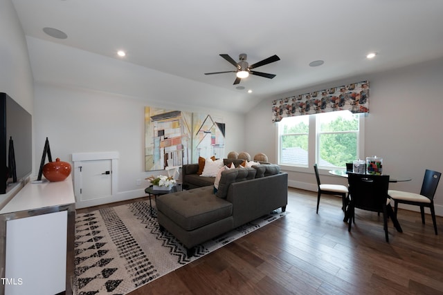 living room featuring hardwood / wood-style flooring, lofted ceiling, and ceiling fan