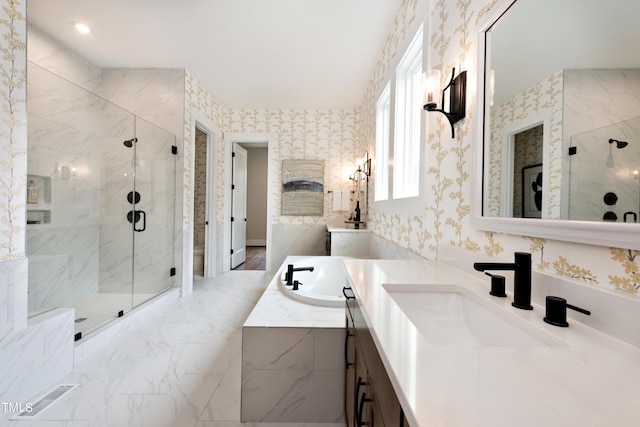 bathroom featuring vanity and shower with separate bathtub