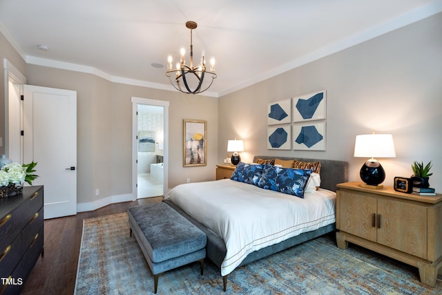 bedroom with ensuite bathroom, dark hardwood / wood-style floors, ornamental molding, and an inviting chandelier