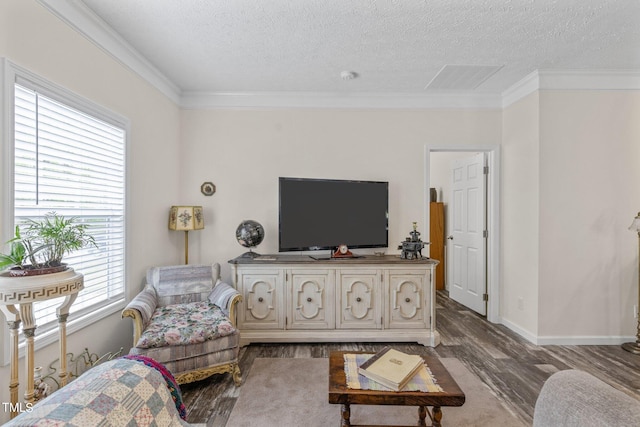 living room with dark hardwood / wood-style flooring, crown molding, and a textured ceiling