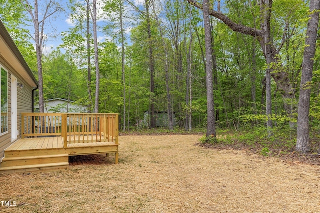 view of yard with a deck