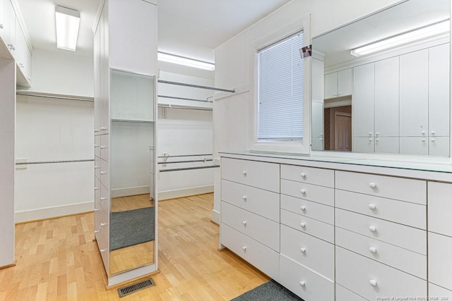 spacious closet with visible vents and light wood finished floors