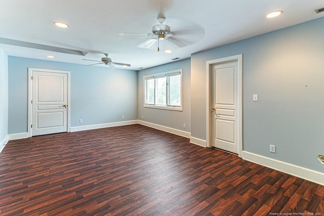 empty room featuring ceiling fan and hardwood / wood-style floors