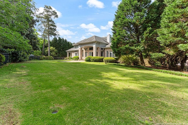 view of yard featuring fence