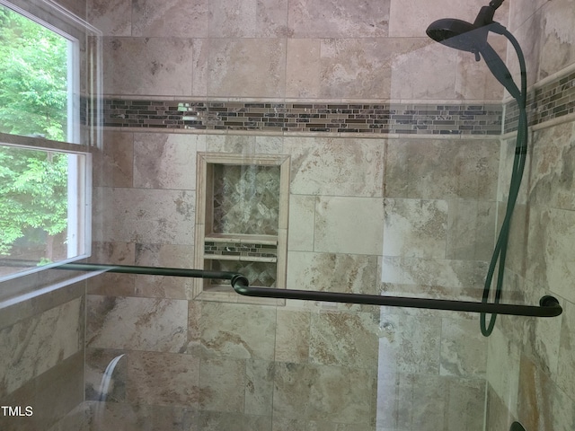 room details with a tile shower