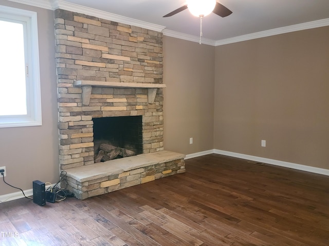 unfurnished living room featuring a fireplace, dark hardwood / wood-style flooring, and crown molding