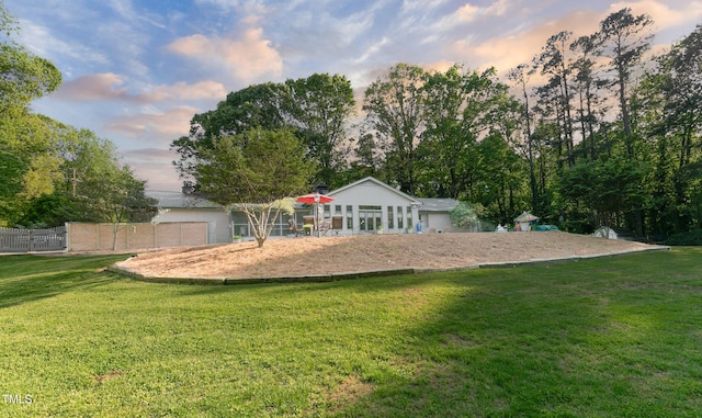 playground at dusk with a lawn