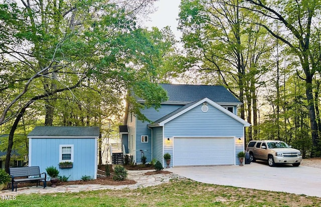 view of front facade with a garage and an outdoor structure