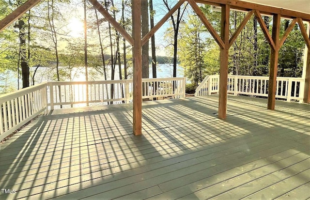 wooden terrace with a water view