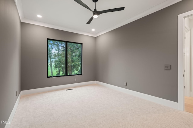 carpeted spare room with recessed lighting, visible vents, ceiling fan, and baseboards