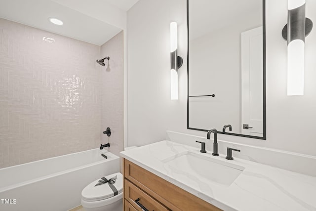 full bath with toilet, vanity, and shower / tub combination