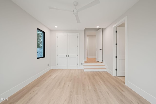 unfurnished room with baseboards, recessed lighting, a ceiling fan, and light wood-style floors