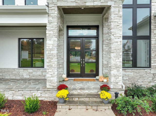 entrance to property featuring french doors