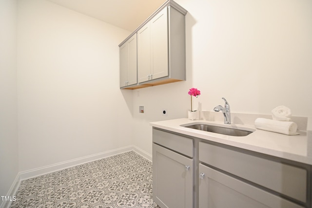 laundry area with sink, washer hookup, cabinets, light tile patterned floors, and hookup for an electric dryer