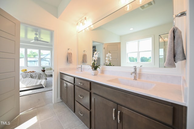 bathroom featuring a wealth of natural light, ceiling fan, hardwood / wood-style floors, and vanity