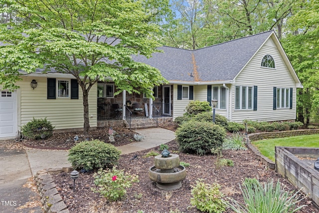 ranch-style house featuring a garage