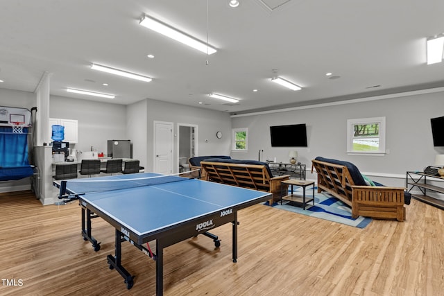 recreation room featuring light hardwood / wood-style floors