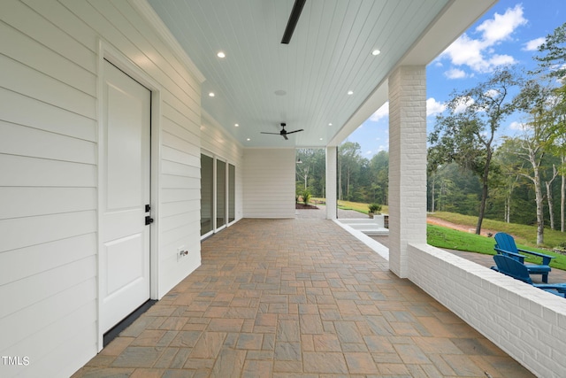 view of patio with ceiling fan