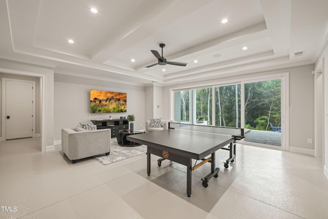 game room with ceiling fan and beamed ceiling