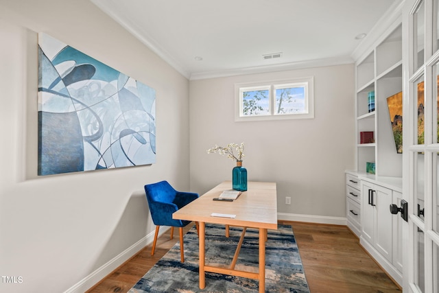 office space featuring dark wood-type flooring and crown molding