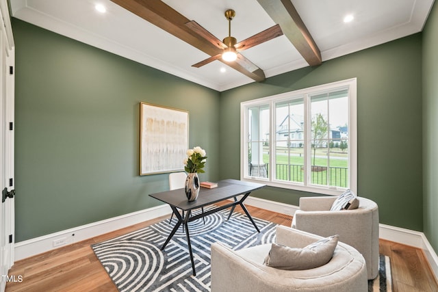 office area featuring ceiling fan, beamed ceiling, and hardwood / wood-style flooring