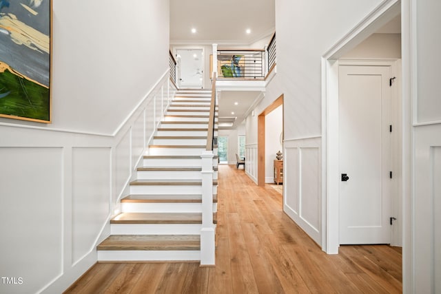 staircase featuring hardwood / wood-style flooring