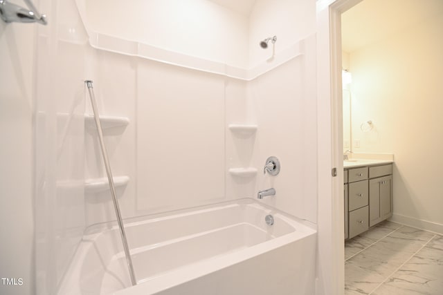 bathroom featuring shower / tub combination and vanity