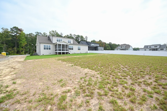 view of yard featuring a sunroom