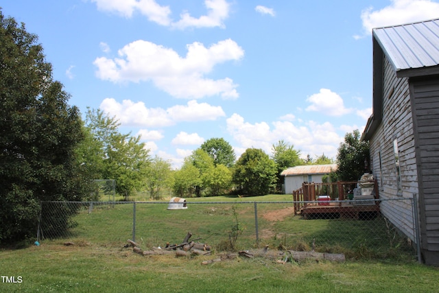 view of yard with a deck