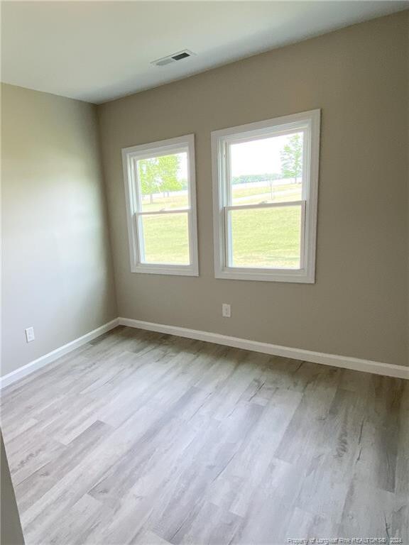 empty room featuring light wood-type flooring