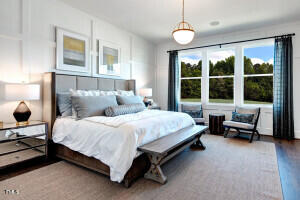 bedroom with hardwood / wood-style flooring