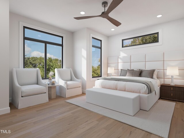 bedroom featuring light wood finished floors, multiple windows, and recessed lighting