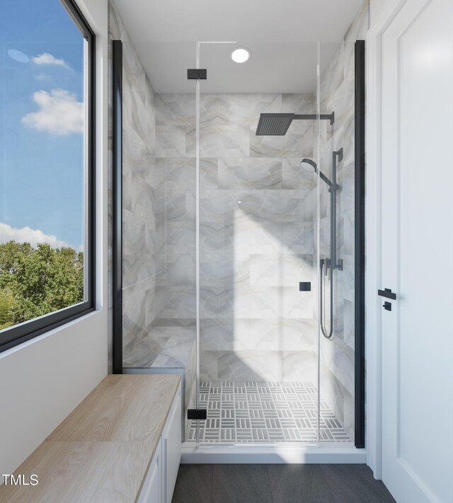 full bathroom with a shower stall and recessed lighting