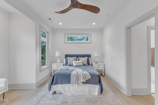 bedroom featuring recessed lighting, baseboards, visible vents, and light wood finished floors