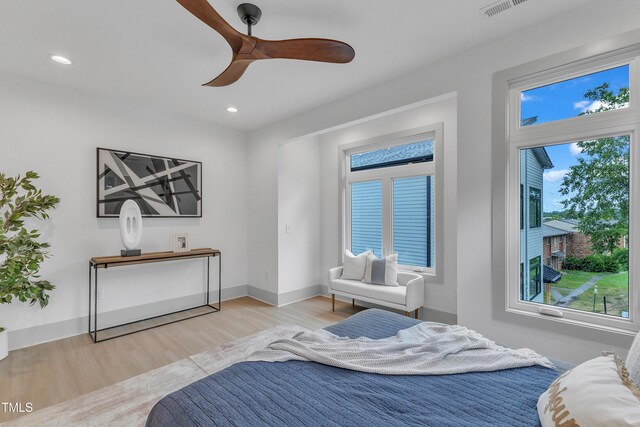 bedroom with recessed lighting, wood finished floors, a ceiling fan, visible vents, and baseboards