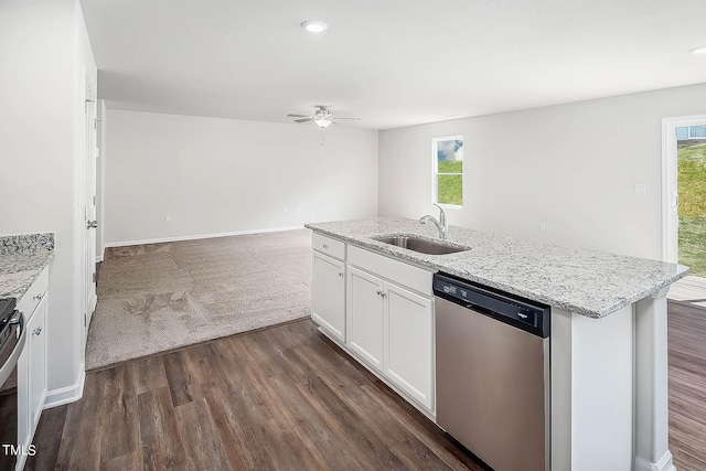 kitchen featuring light stone counters, stainless steel appliances, ceiling fan, sink, and white cabinetry