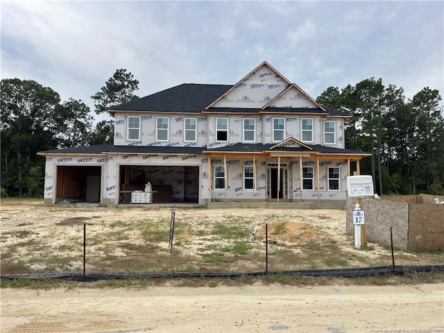 unfinished property with covered porch