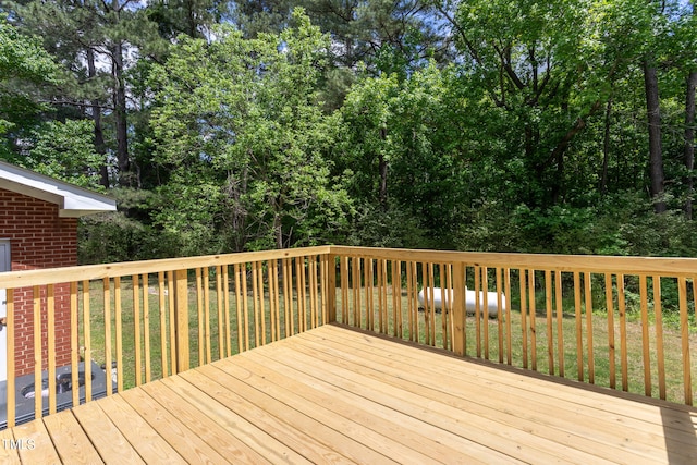 deck featuring a yard