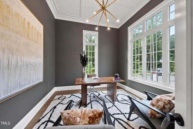 office with an inviting chandelier, a wealth of natural light, and hardwood / wood-style floors