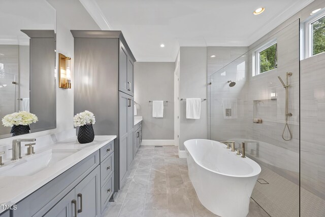 bathroom featuring vanity, shower with separate bathtub, and ornamental molding