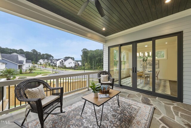 wooden terrace with ceiling fan