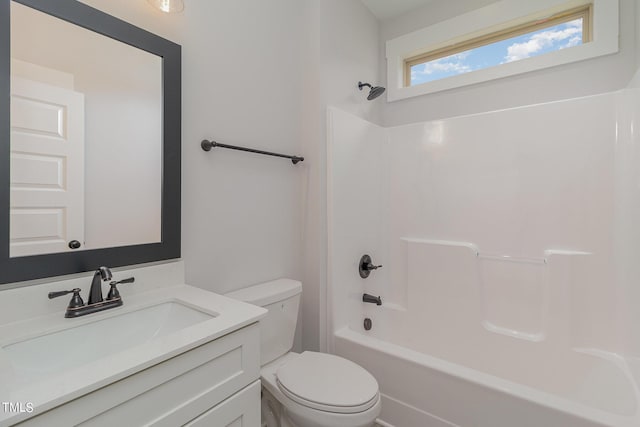 full bath with toilet, bathtub / shower combination, and vanity