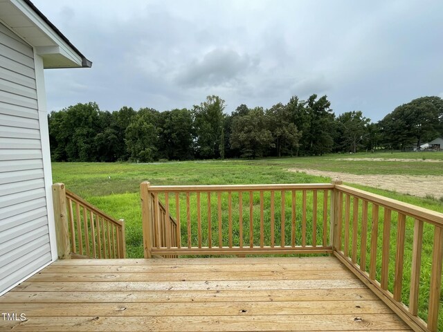 deck featuring a yard