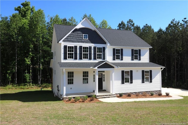 view of front of home featuring a front lawn and a porch