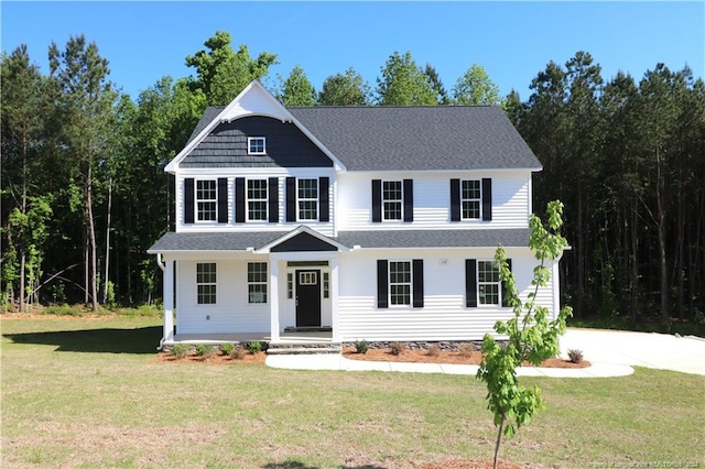 view of front of home with a front lawn