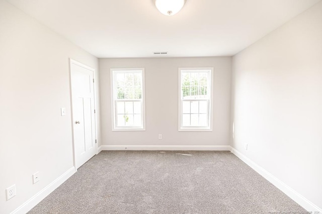 empty room featuring carpet