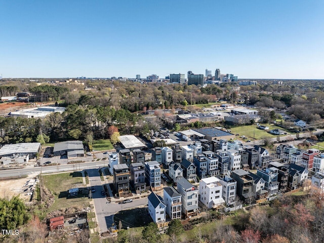 birds eye view of property with a view of city